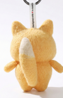 Back view of a handmade Woobbi fox keychain, crafted from fuzzy yellow wool felt. It features a fluffy tail with a white tip and a small white tag attached to the top that reads 'Designed with ❤️ in Austin'. The keychain has a round black metal ring and is set against a plain white background.