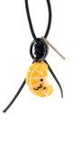 Hanging view of handcrafted wool citrus keychain featuring a black leather cord, black metal hardware, and a soft orange fruit design.