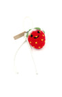 Front view of cute red strawberry bag accessory with white leather cord, highlighting the handmade Merino wool texture.