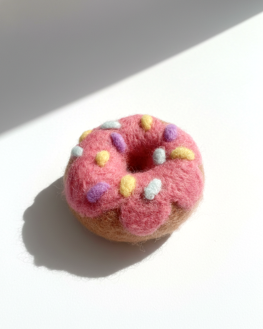 Pink donut wool magnet with sprinkle details, handmade needle-felted food magnet
