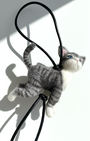 Handmade realistic gray tabby wool cat sculpture charm in standing pose with lifelike expression and raised tail