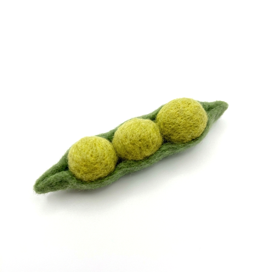 Felted green pea pod with three peas on a white background