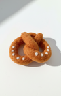Handmade pretzel wool magnet, needle-felted with twisted form and warm baked tones
