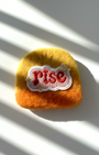 Minimalist yellow wool fridge magnet with Rise patch and star accents, handmade needle-felted home decor