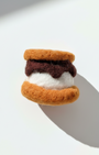Handcrafted wool s’more magnet with toasted biscuit texture and layered detail