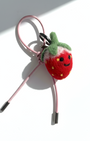 Handmade wool felt strawberry keychain with pink leather loop, needle-felted fruit bag charm