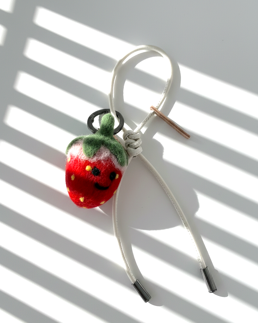 Needle felt strawberry charm with white leather strap, handmade wool fruit keychain