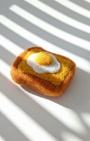 Wool egg toast fridge magnet shown at an angle, highlighting layered felt texture