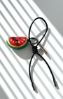 Needle felt watermelon slice charm with black leather strap, handmade wool fruit keychain